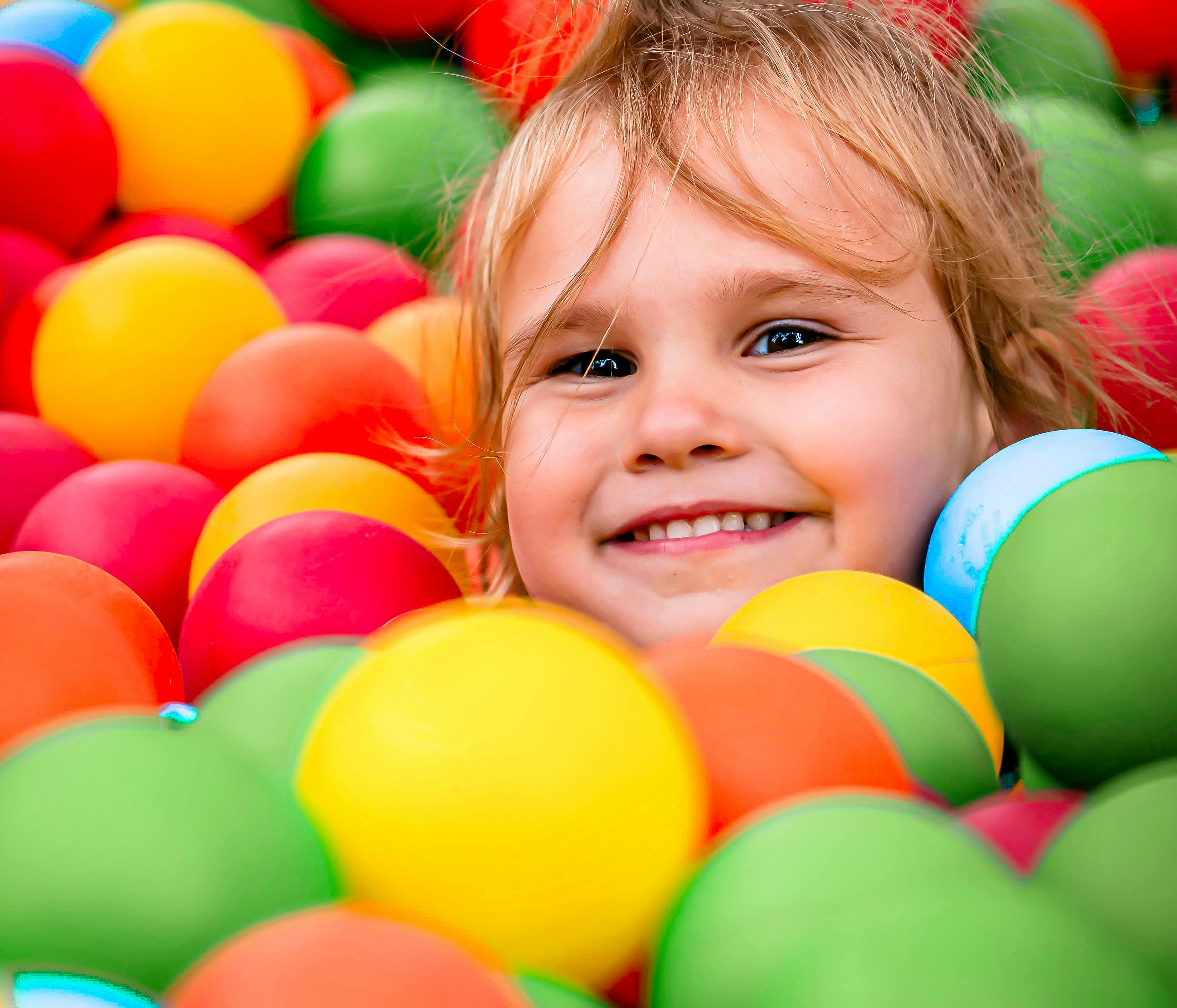 Teacher guiding a group of children